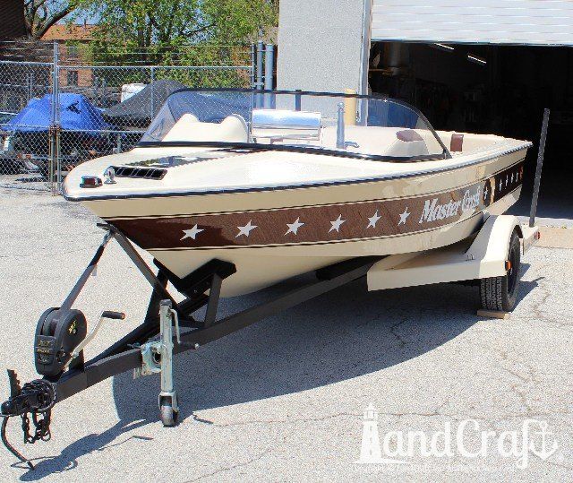 Mastercraft Stars & Stripes boat after exterior restoration with glossy metalflake and new decal stars applied