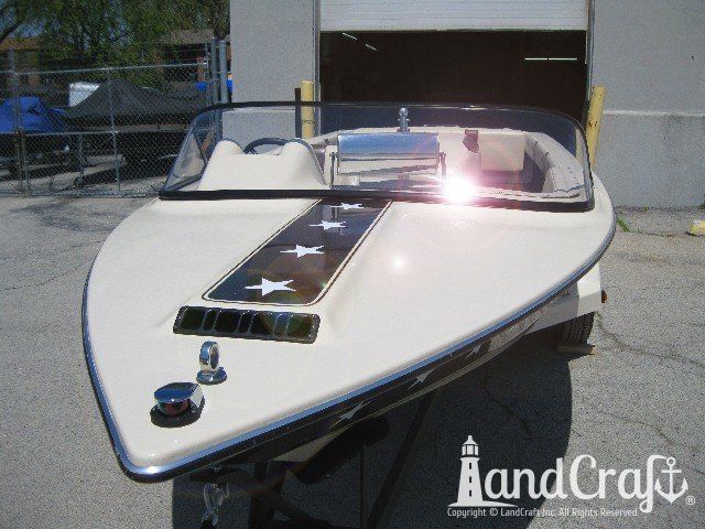 Mastercraft Stars & Stripes boat after exterior restoration with glossy metalflake and new decal stars applied
