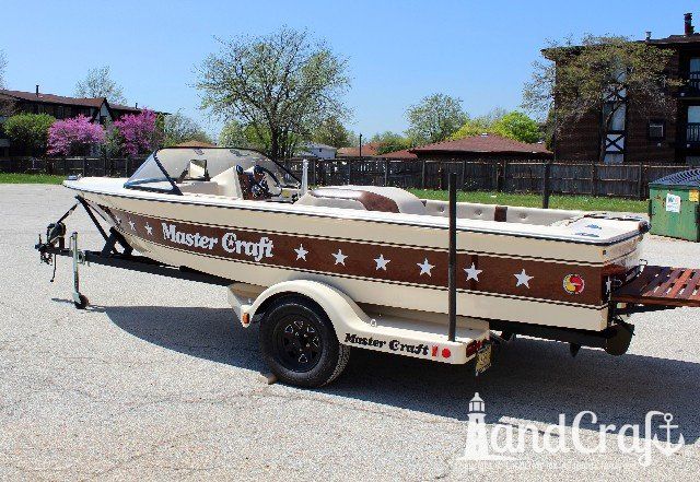 Mastercraft Stars & Stripes boat after exterior restoration with glossy metalflake and new decals applied
