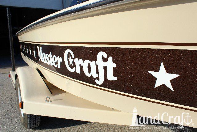 Mastercraft Stars & Stripes boat after exterior restoration with glossy metalflake and new decals applied