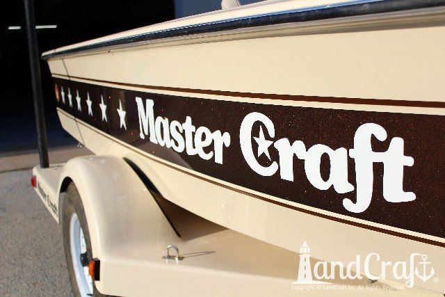 Mastercraft Stars & Stripes boat after exterior restoration with glossy metalflake and new decals applied