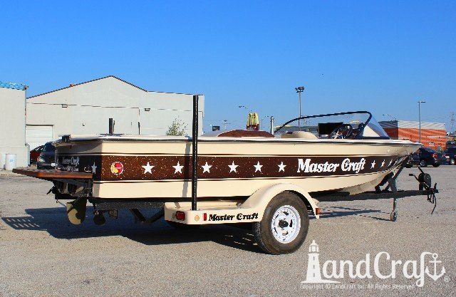 Mastercraft Stars & Stripes boat after exterior restoration with glossy metalflake and new decals applied