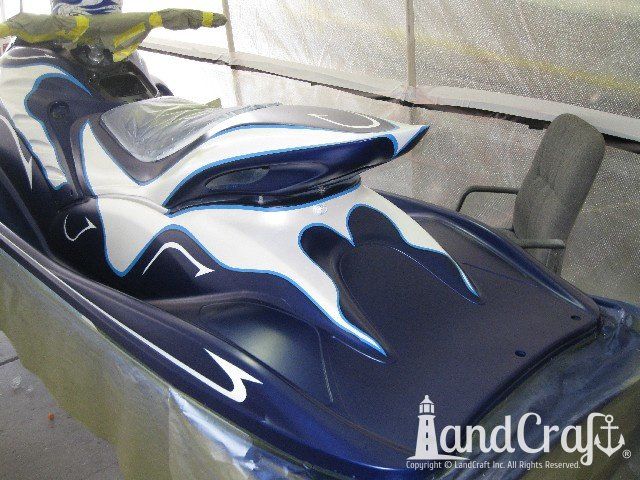 Yamaha waverunner with custom paint graphics in white over a deep metallic blue finish