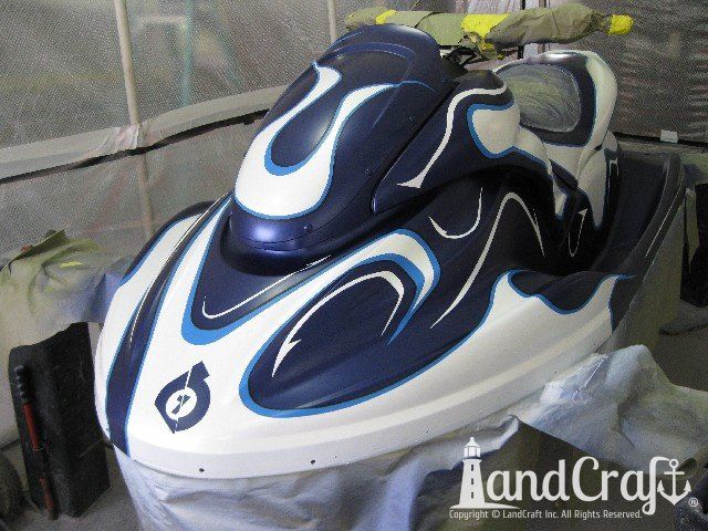 Yamaha waverunner with custom paint graphics in white over a deep metallic blue finish