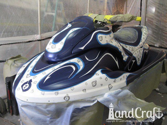 Yamaha waverunner with custom race graphics getting installed