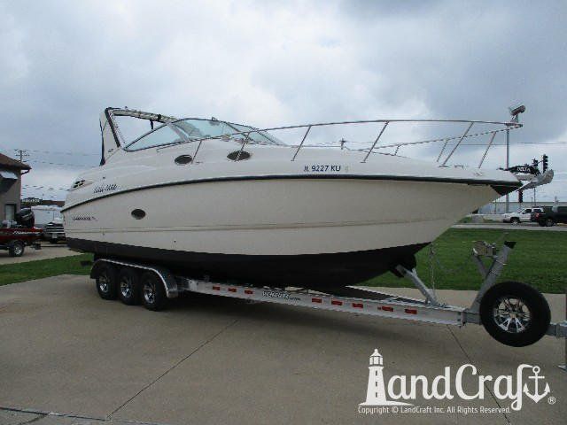 Fiberglass and gelcoat repair with new emblem on Chaparral boat