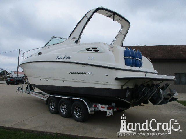Fiberglass and gelcoat repair with new emblem on Chaparral boat