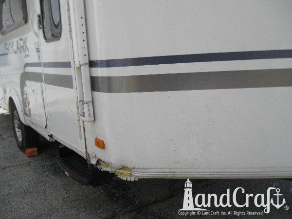 Structural aluminum and fiberglass RV damage