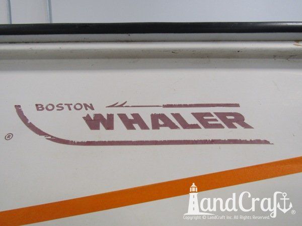 Boston Whaler with faded logo decal