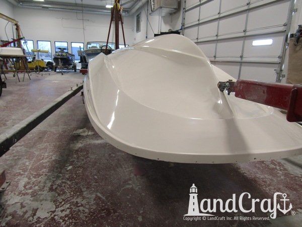 Boston Whaler with gelcoat refinishing completed on the bottom hull