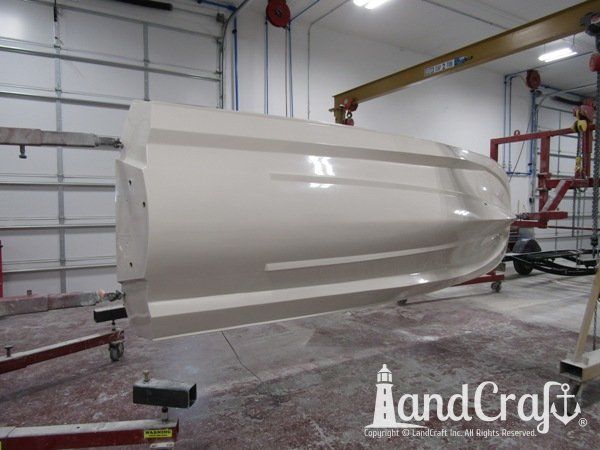 Boston Whaler with gelcoat refinishing completed on the bottom hull