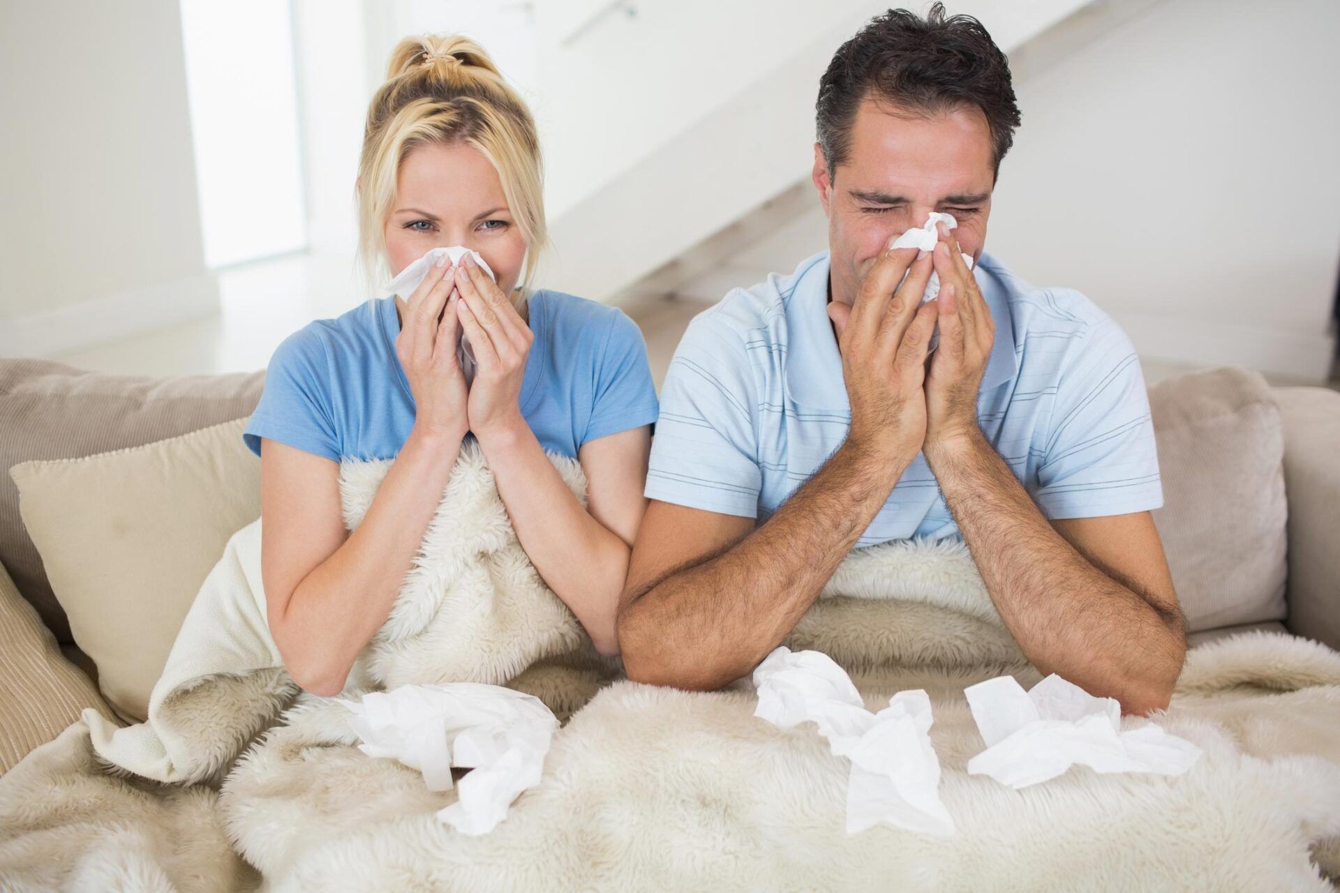 Couple suffering from cold — Wilmington, NC — Wilmington Ear Nose and Throat Associates, P.A.