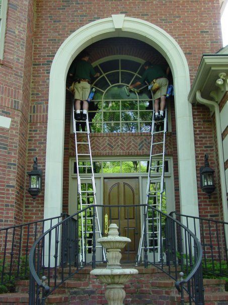 Scrubbing Above Front Door | Nashville, TN | Alpine Window Cleaning & Pressure Washing