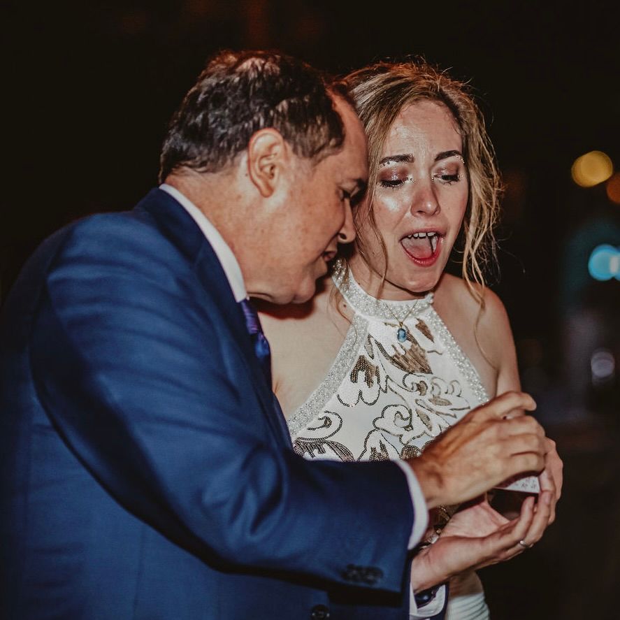 Wedding magician David Martinez performs an amazing trick for a bride at her reception