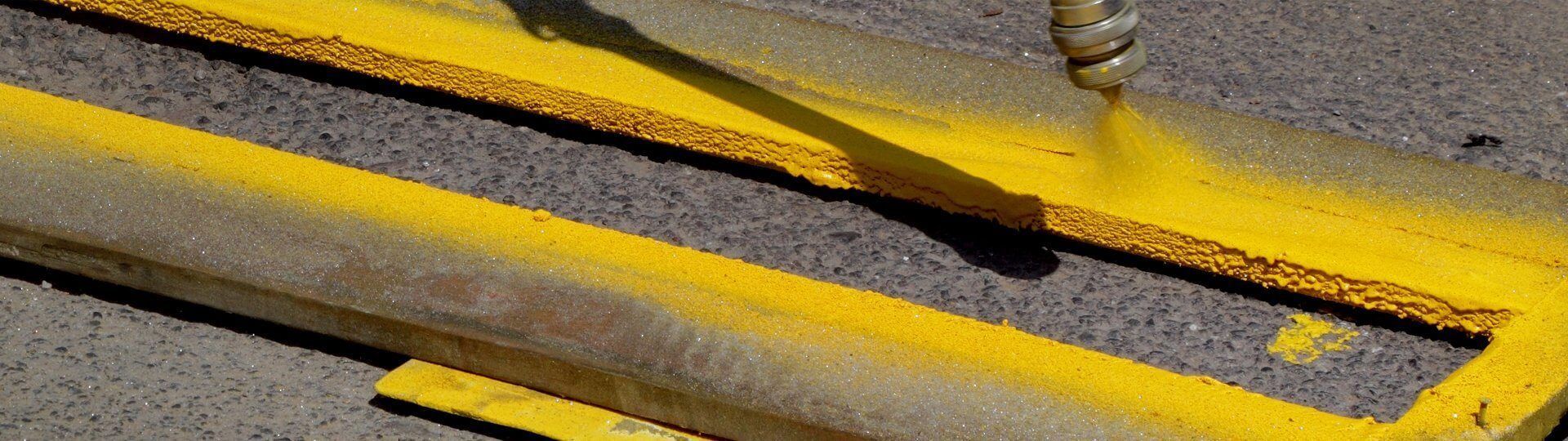 Yellow paint road marking