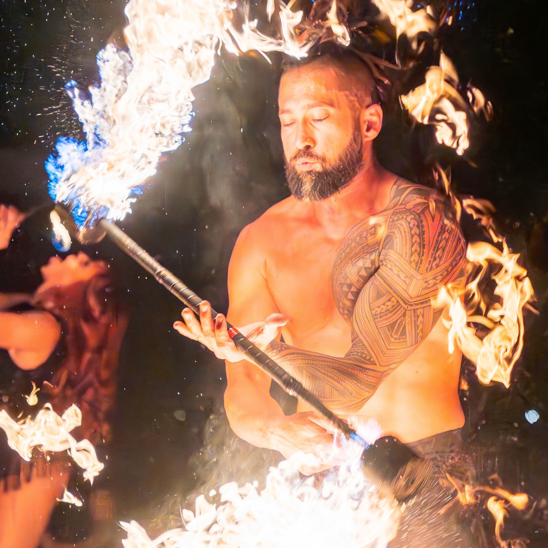 Photo of Joseph spinning fire