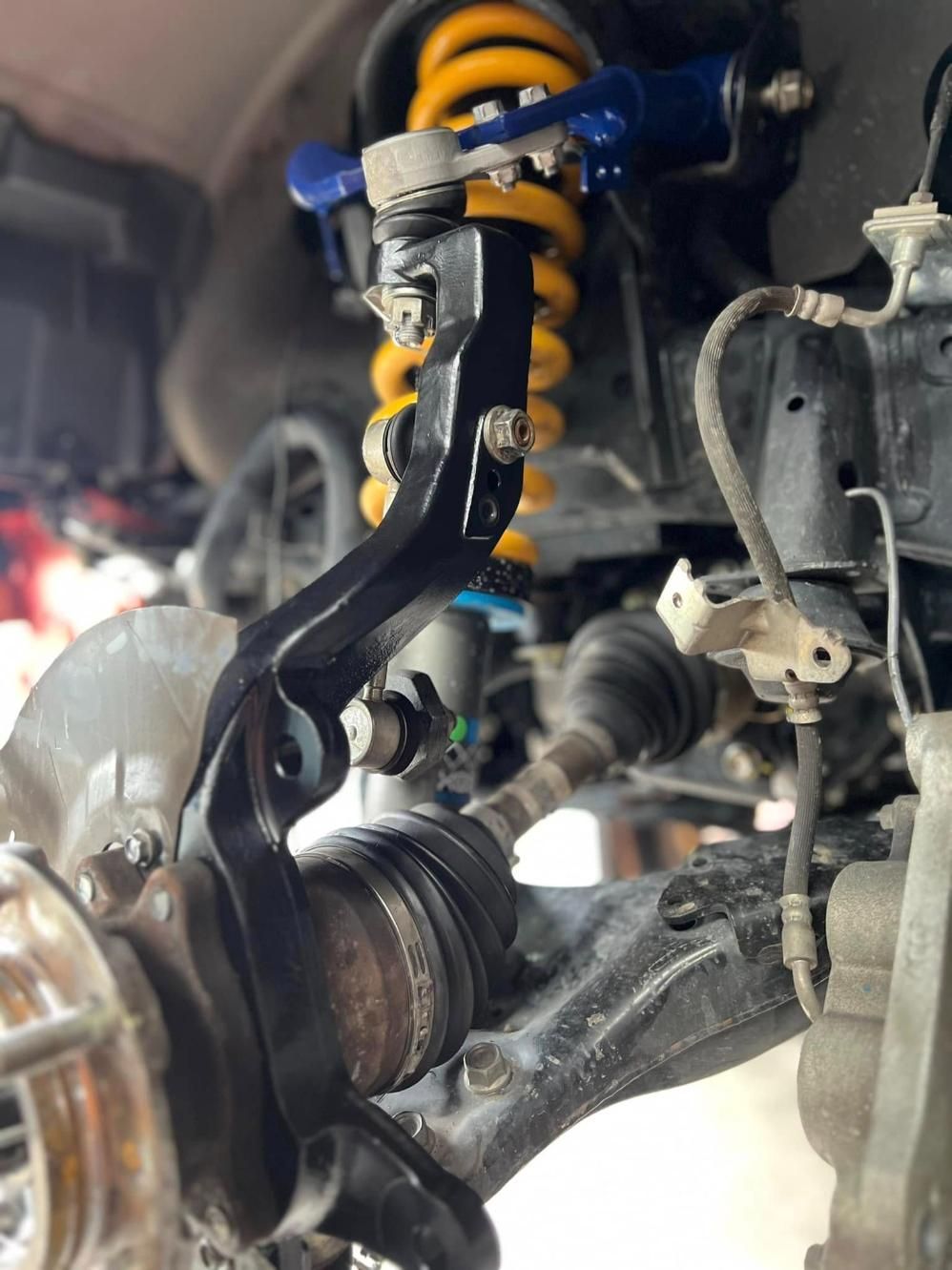 A Close Up of the Underside of a Car With a Suspension System — Shoalhaven Diesel Tech in South Nowra, NSW