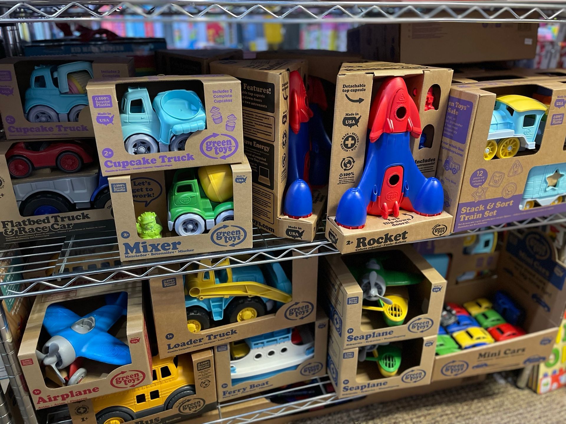 toys in boxes on floor