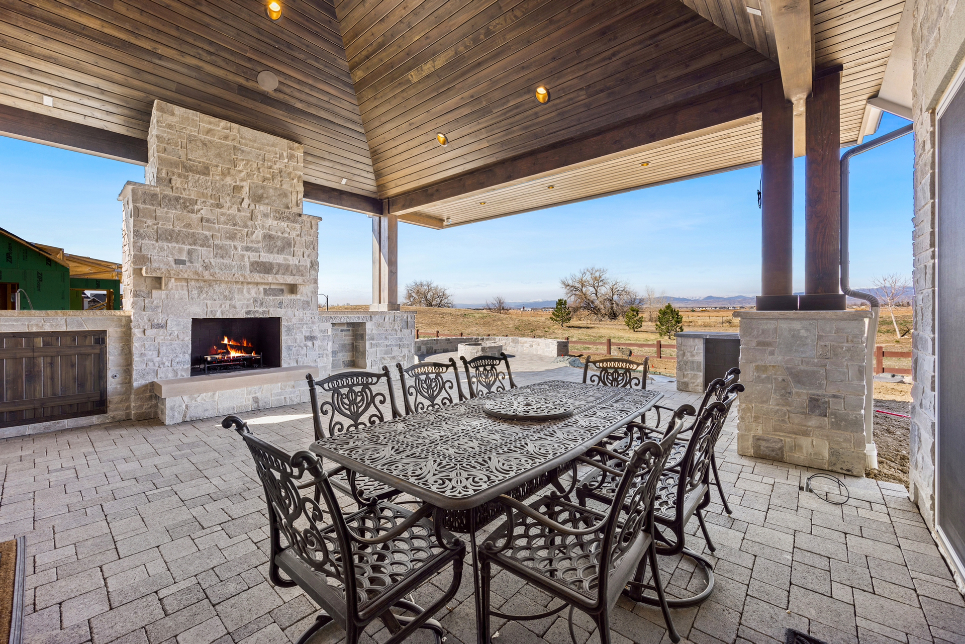 An outdoor deck with outdoor lighting