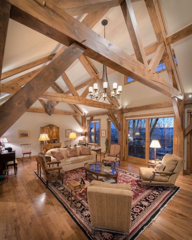 A living room filled with furniture and a chandelier
