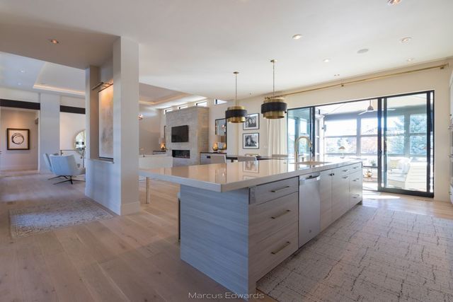 There is a large island in the middle of the kitchen.