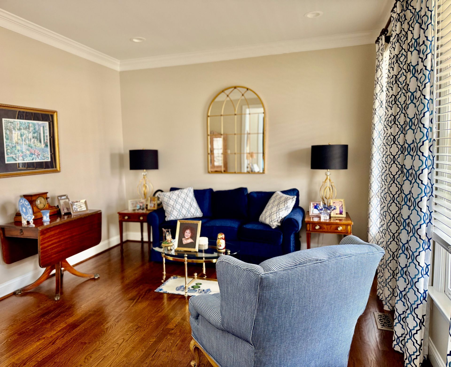Person sealing a cardboard box with tape.