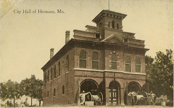 A black and white photo of the city hall of homan missouri