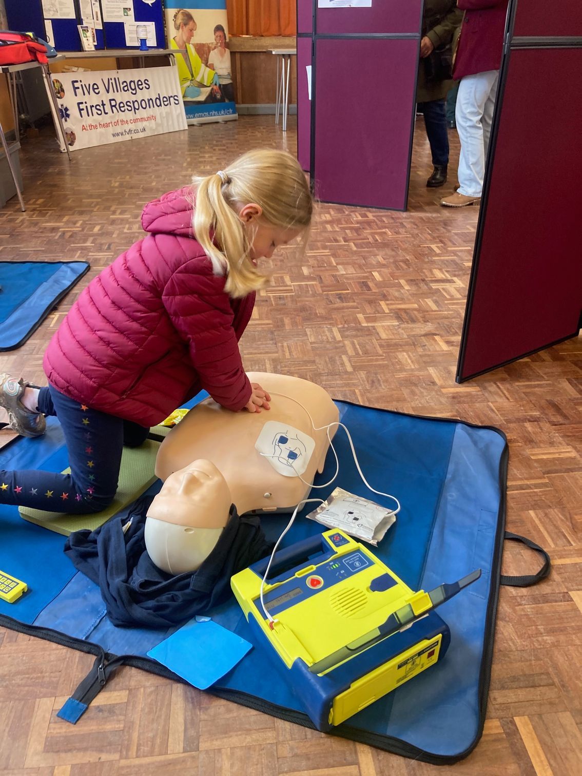 Never too young to learn life-saving skills - 5 year old Imogen Wright demonstrates chest compressions. 