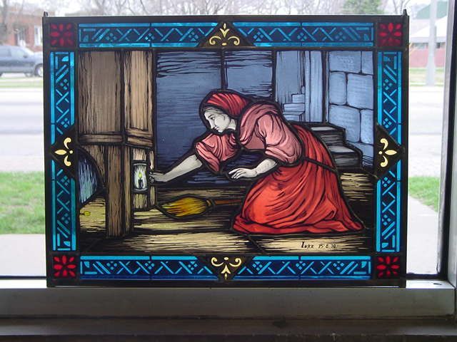 A stained glass painting of a woman sweeping the floor