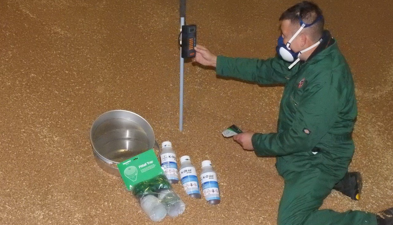 pest control technician performing pest control services in grain - Command Pest Control LTD