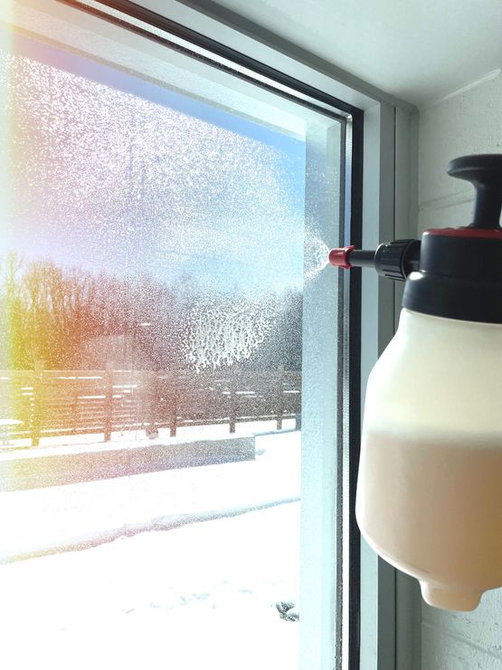 Picture of Windows being cleaned for window tint installation. Photo was taken in Peterborough