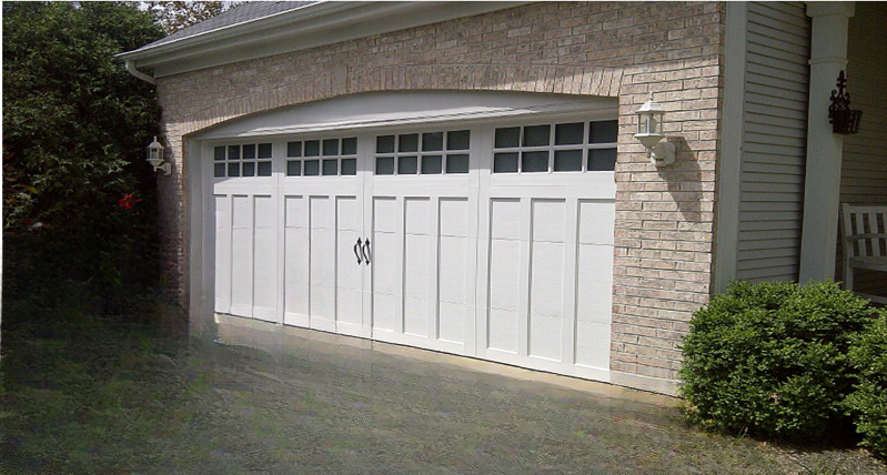 Steel carriage garage doors with balanced panel layouts by Garage Tech serving Woodinville, WA