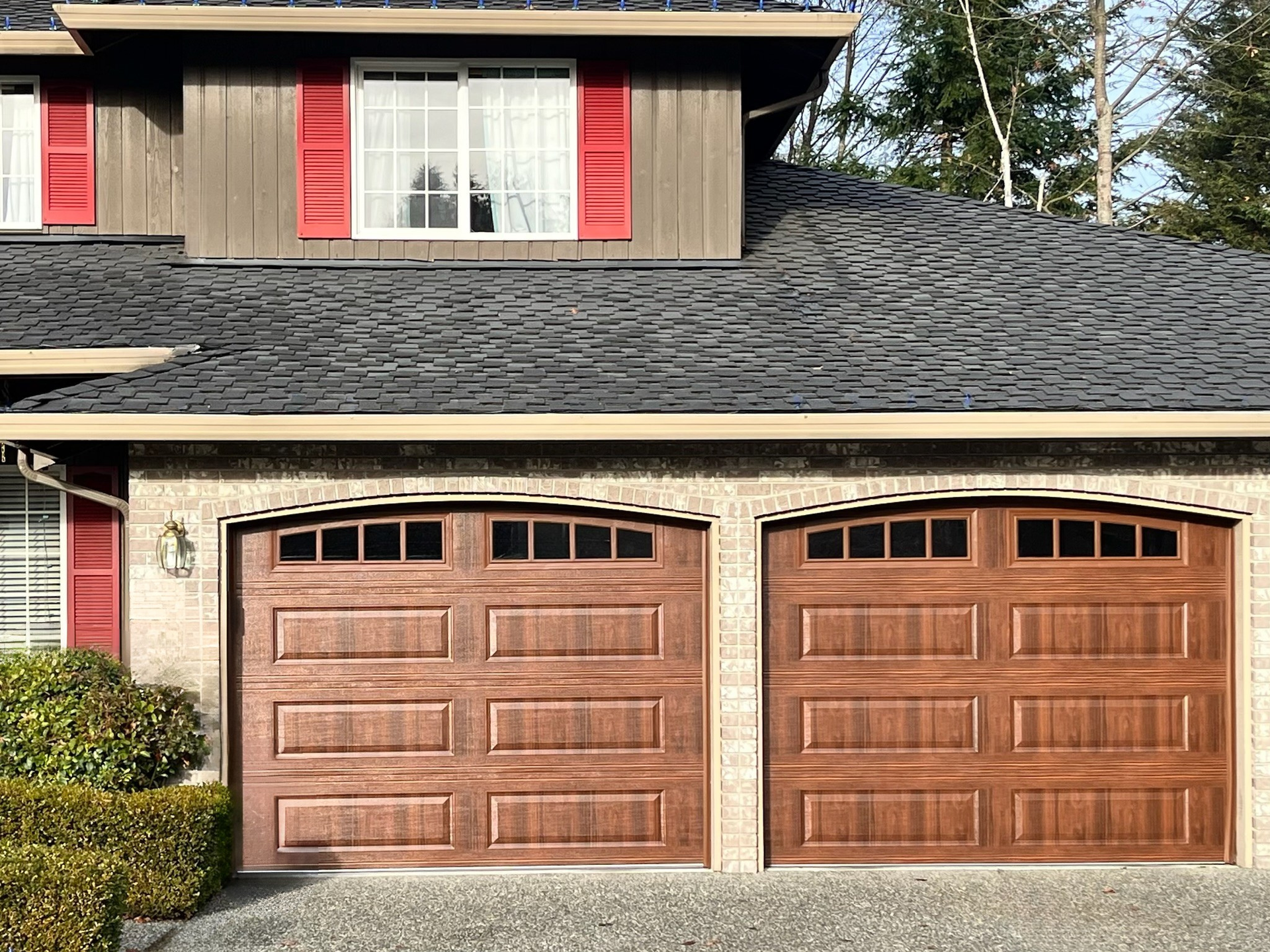 Residential steel carriage garage doors with classic appeal by Garage Tech serving Shoreline, WA