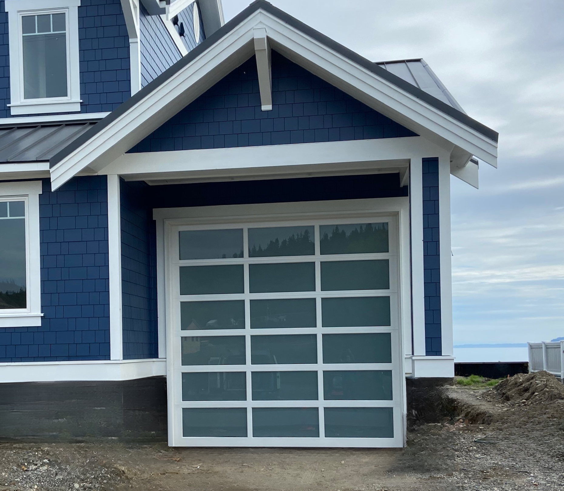 Modern garage doors with architectural appeal by Garage Tech serving Woodinville, WA