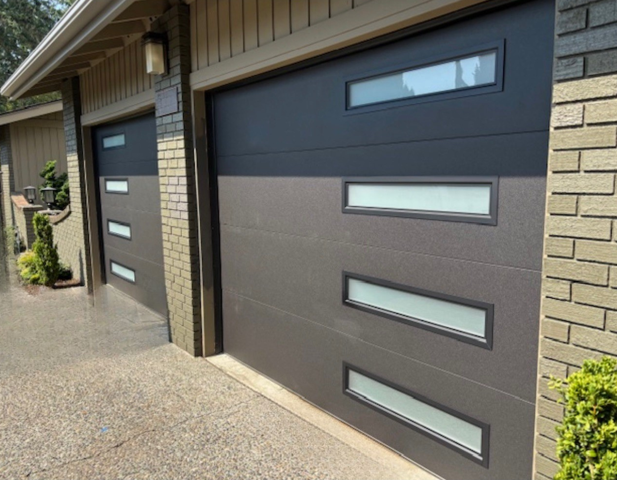 Contemporary garage doors for contemporary residential design by Garage Tech serving Marysville, WA