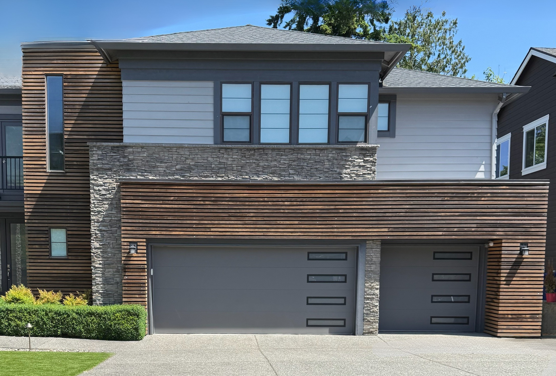Contemporary garage doors with balanced modern styling by Garage Tech serving Bellevue, WA