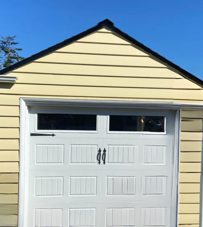 Wood carriage garage door for residential homes by Garage Tech serving Lynnwood, WA