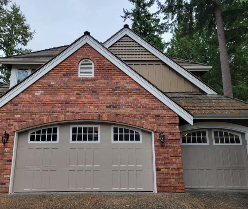  Steel carriage garage doors with raised panel design by Garage Tech serving Shoreline, WA