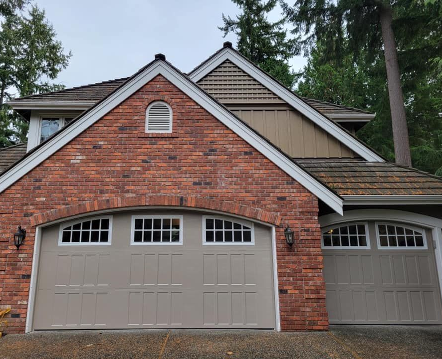 Residential steel carriage garage doors built for durability by Garage Tech serving Mountlake Terrace, WA