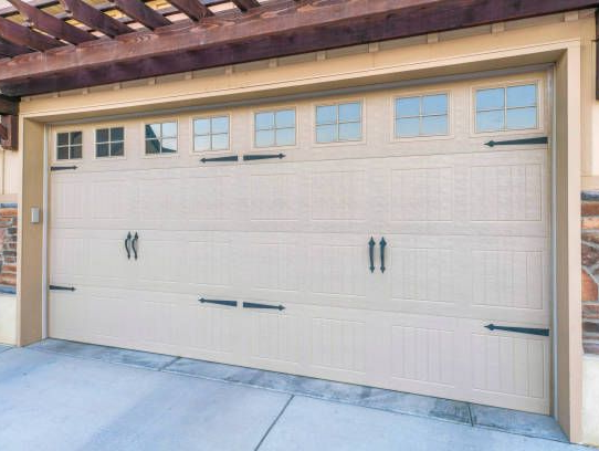 Steel carriage garage doors with traditional proportions by Garage Tech serving Bellevue, WA
