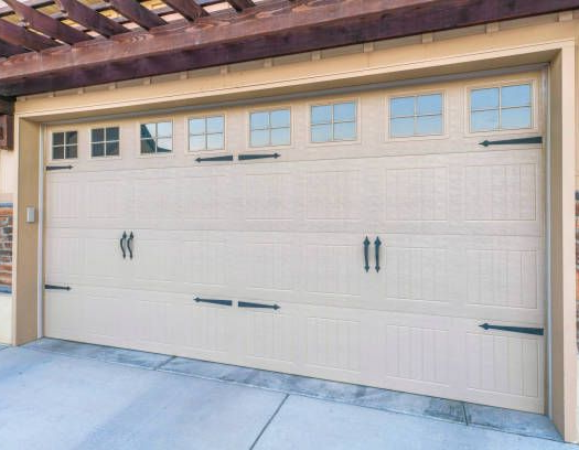 Steel carriage garage doors with traditional proportions by Garage Tech serving Bellevue, WA