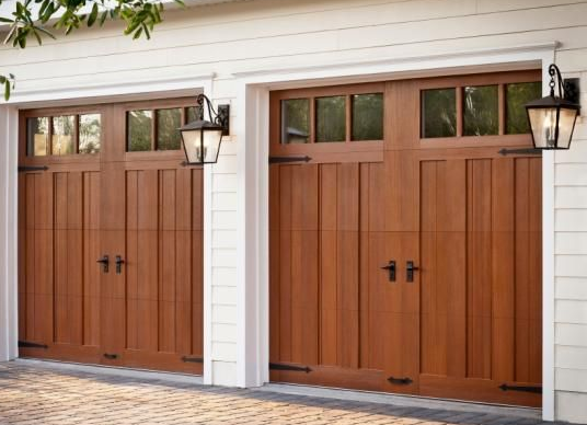 Custom wood carriage garage doors emphasizing craftsmanship by Garage Tech serving Kenmore, WA