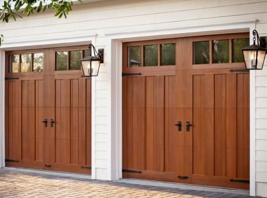 Residential wood carriage garage doors with timeless styling by Garage Tech serving Shoreline, WA