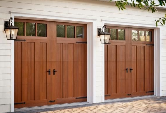 Wood carriage garage doors with warm natural tones by Garage Tech serving Lake Forest Park, WA
