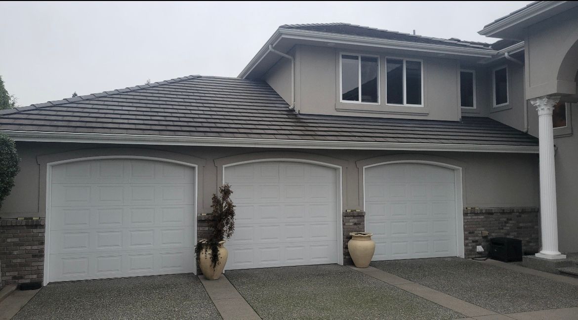 Steel garage doors with traditional styling by Garage Tech serving Mill Creek, WA
