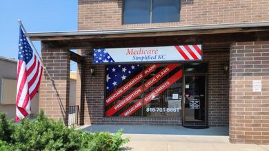 A close up of a worldwide insurance agency logo on a piece of paper.