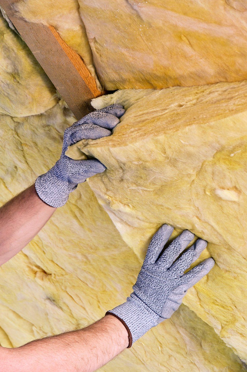 A worker providing new home insulation services in Clallam County, WA