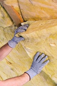 A worker providing new home insulation services in Clallam County, WA