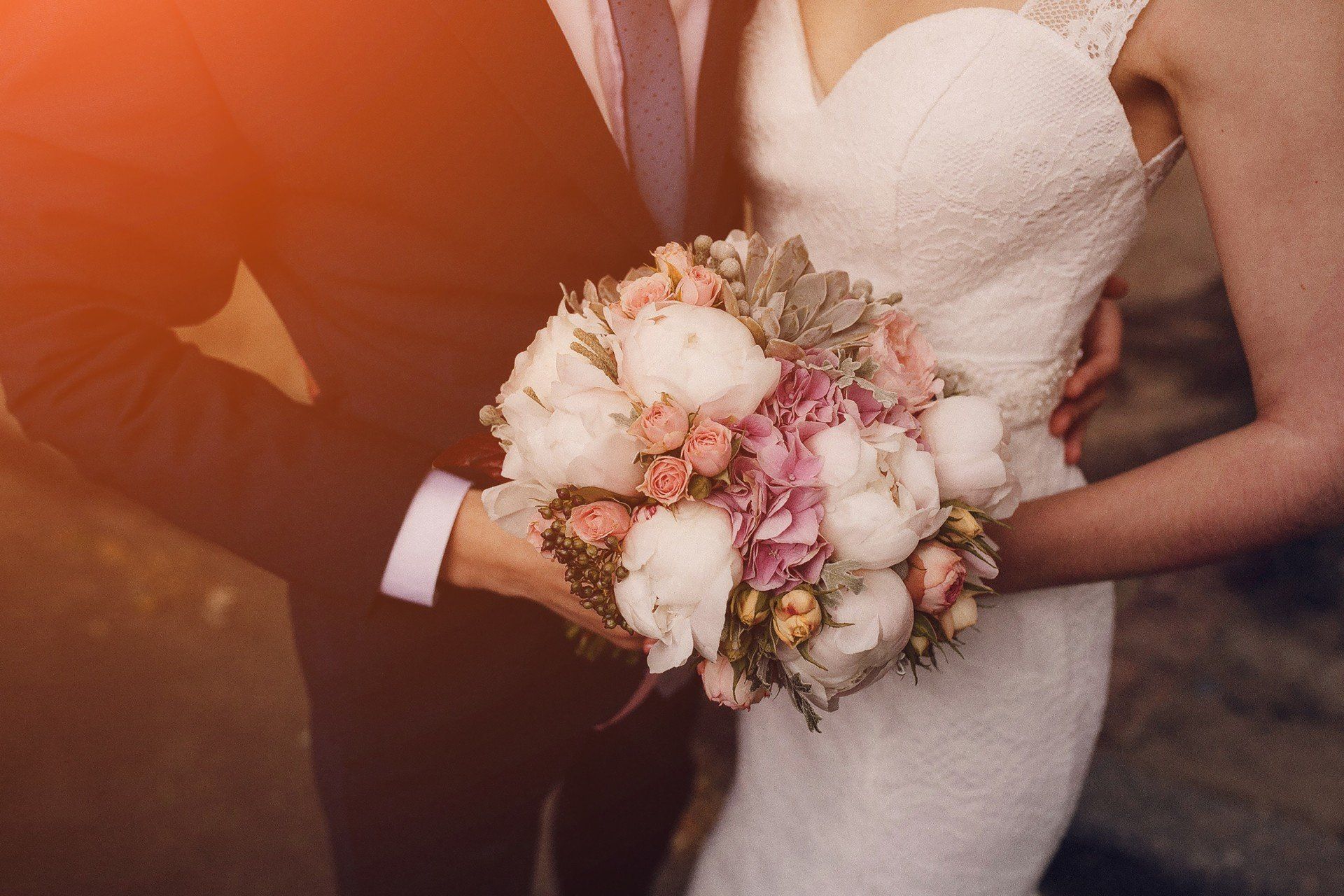 Flower Seller — Couple Holding a Bouquet in Dallas, Texas