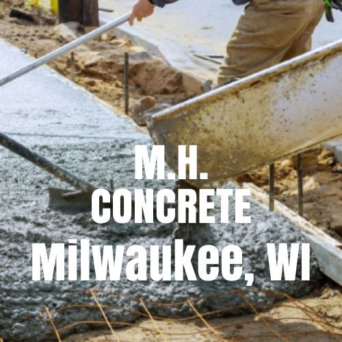 M.h. concrete milwaukee wi is pouring concrete into a wheelbarrow